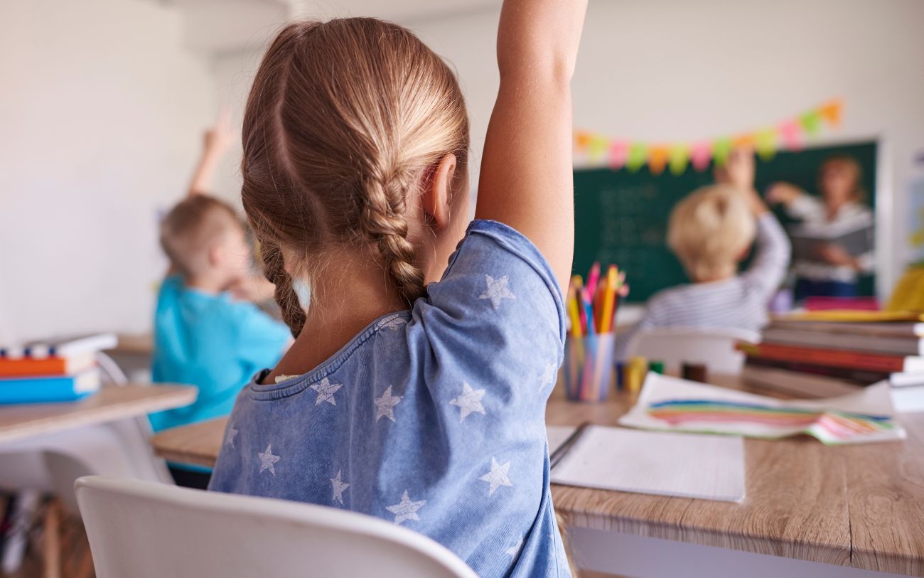 girl raising hand