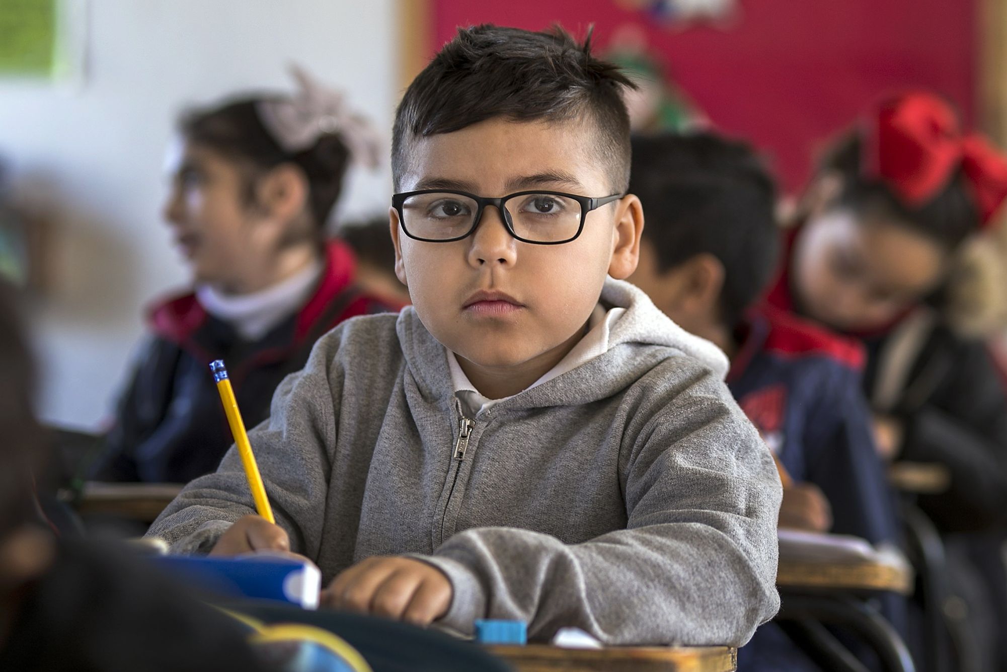 Focused student preparing to take notes