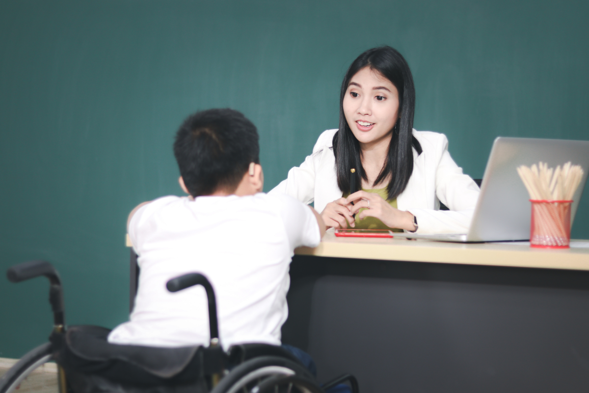student meeting with teacher