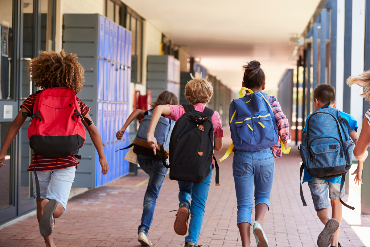 students running out of school summer break